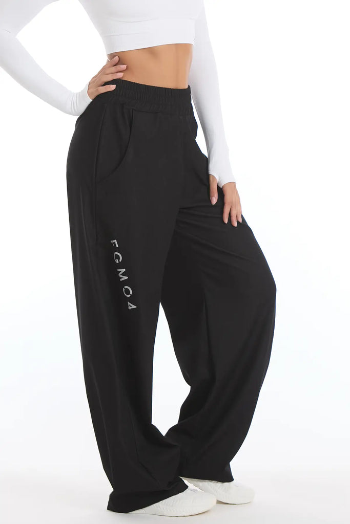 Juodos sportines kelnes moterims