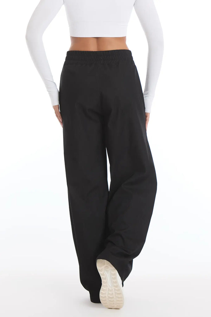 Juodos sportinės kelnės moterims